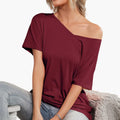 Kobiece t-shirt z krótkim rękawem w oversize'owym stylu z asymetrycznym dołem